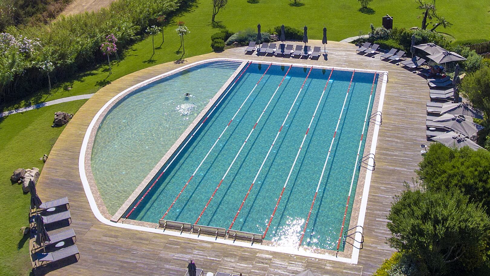 https://www.chialagunaresort.com/wp-content/uploads/2021/05/IHC_Chia-Laguna-Resort_grid_CL4U_pool.jpg