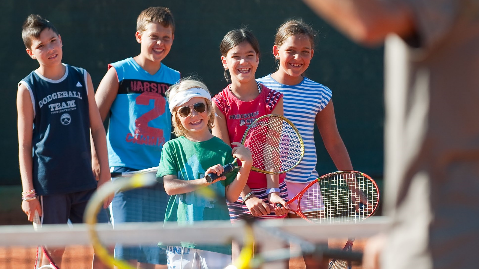 https://www.chialagunaresort.com/wp-content/uploads/2021/05/IHC_Chia-Laguna-Resort_grid_kids_tennis.jpg