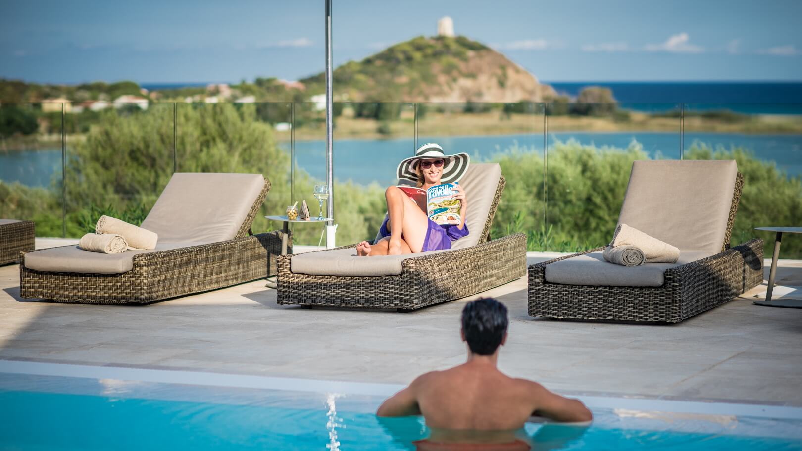 https://www.chialagunaresort.com/wp-content/uploads/2021/05/IHC_Chia-Laguna-Resort_grid_romantic_couple-pool-terrace.jpg