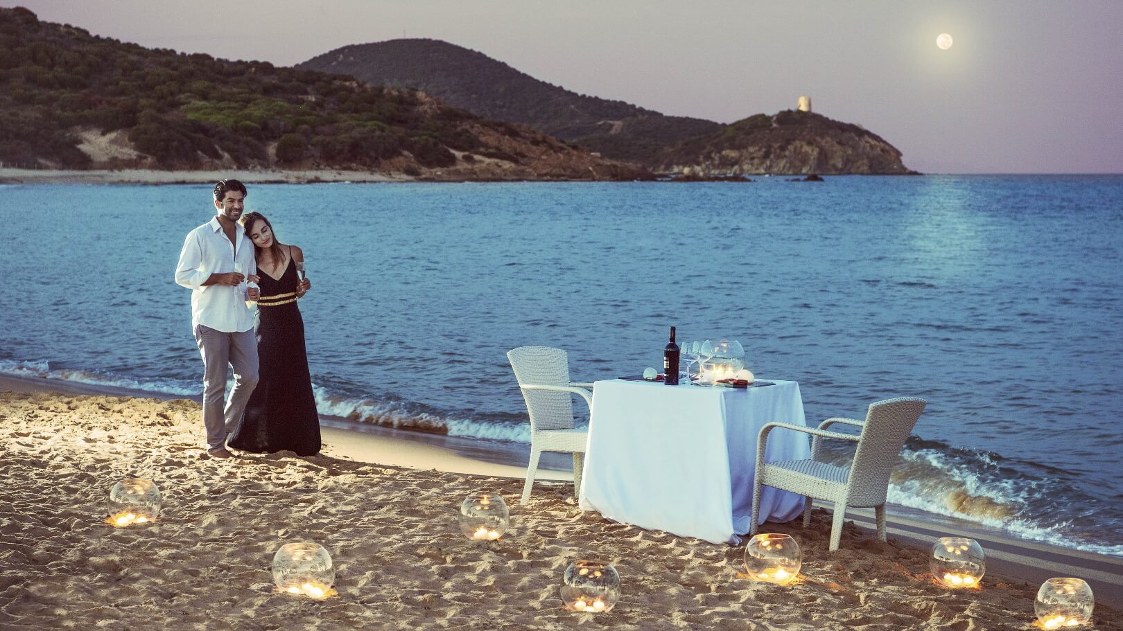 https://www.chialagunaresort.com/wp-content/uploads/2021/05/IHC_Chia-Laguna-Resort_grid_romantic_dinner-beach.jpg